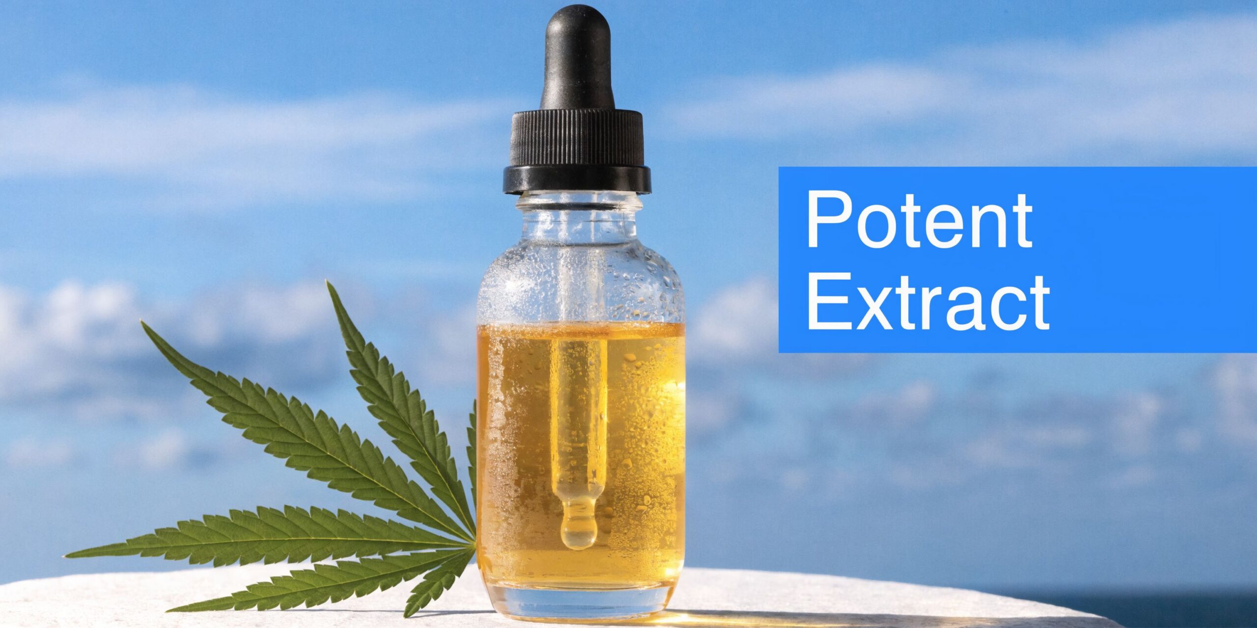A glass dropper bottle of golden THC oil extract next to a green cannabis leaf outside.