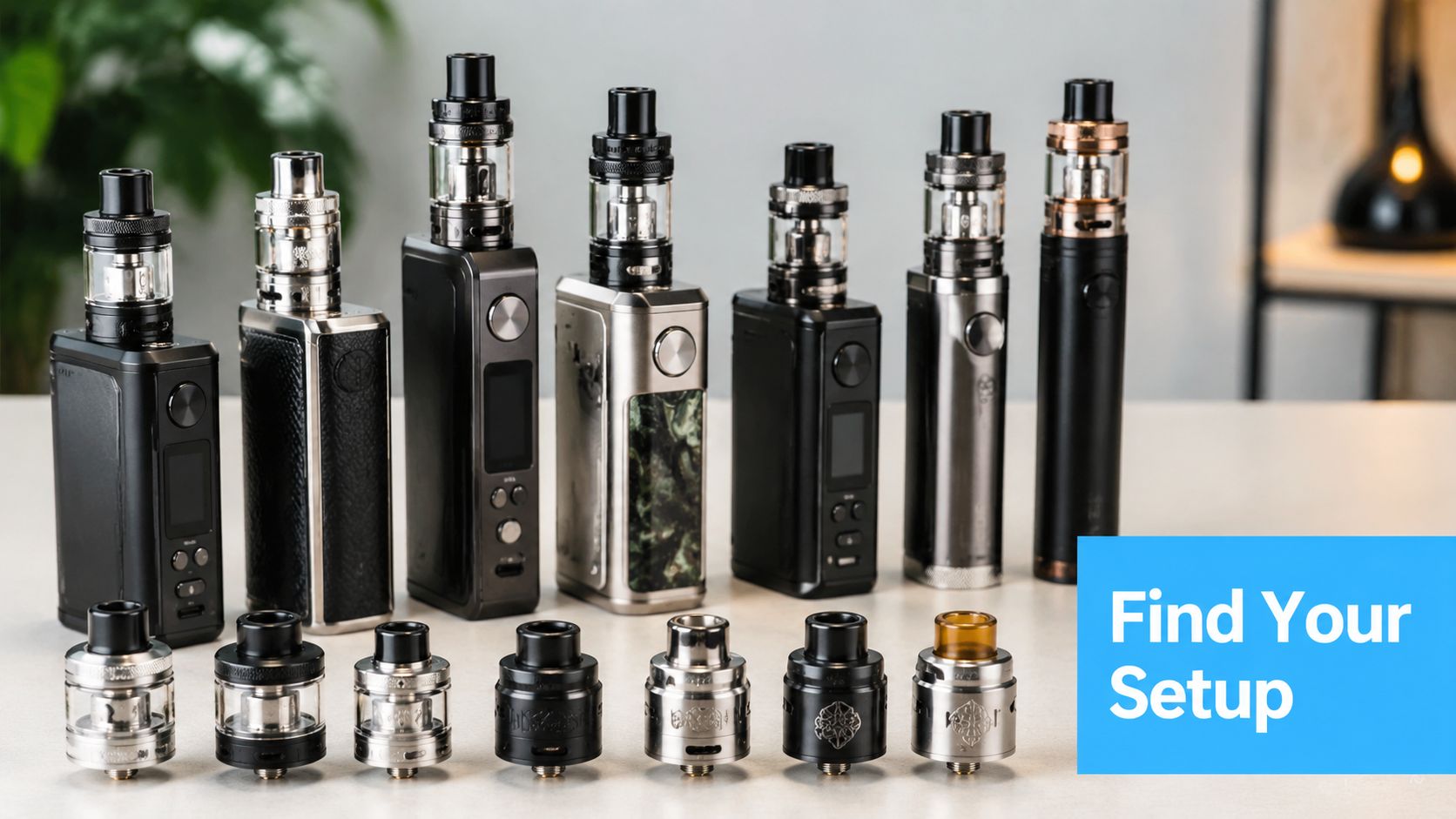 A display of various box mod electronic cigarettes and individual atomizers sitting on a clean surface.