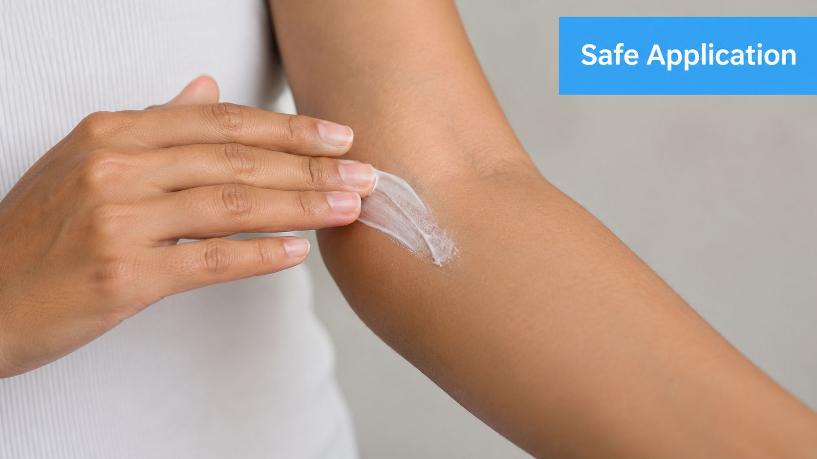 A person applying a soothing white topical cream onto their arm for skin care or pain relief.