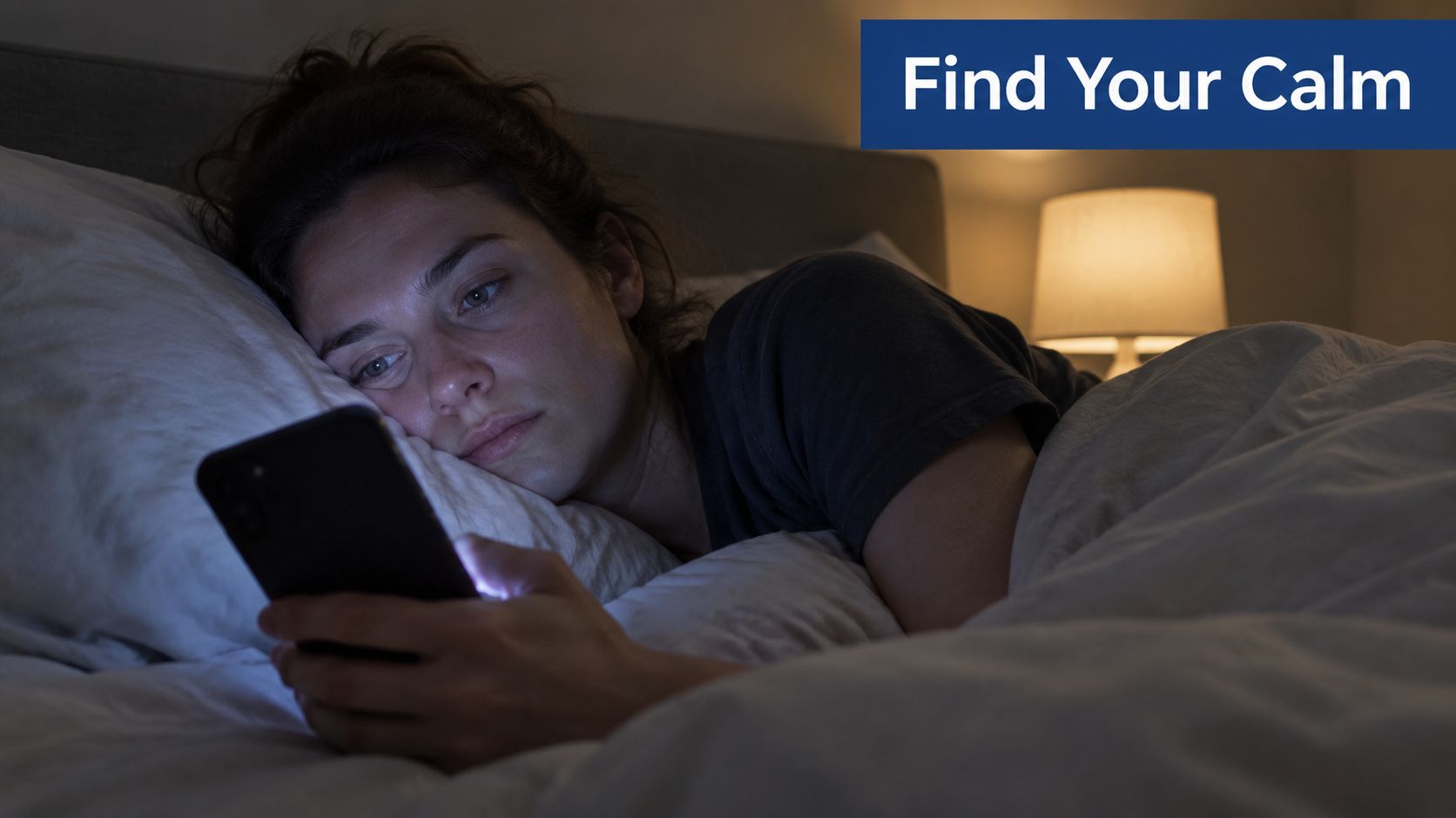 A woman lying in bed at night, looking at her smartphone with a concerned expression.