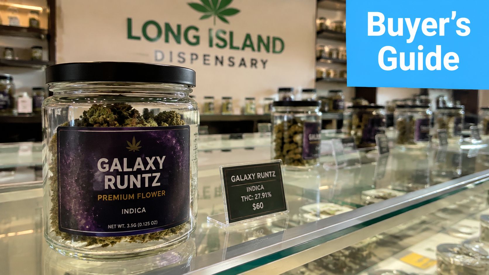 A glass jar of Galaxy Runtz cannabis flower sitting on a glass display counter at a dispensary.