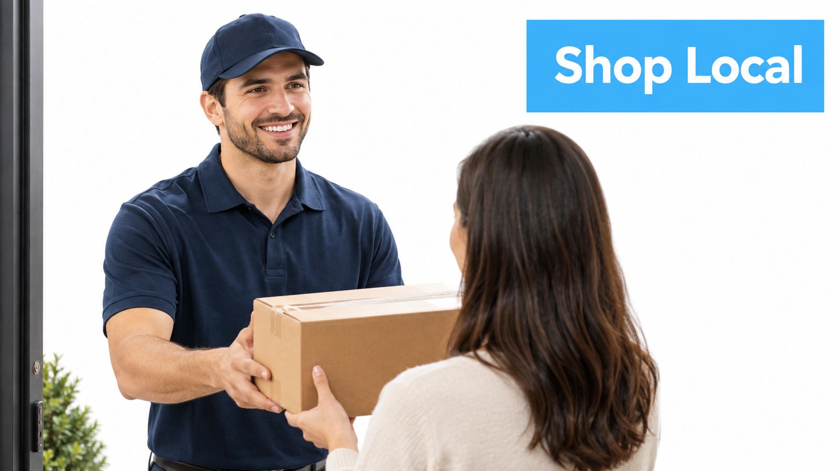 A smiling delivery driver in a blue uniform handing a cardboard package to a female customer.